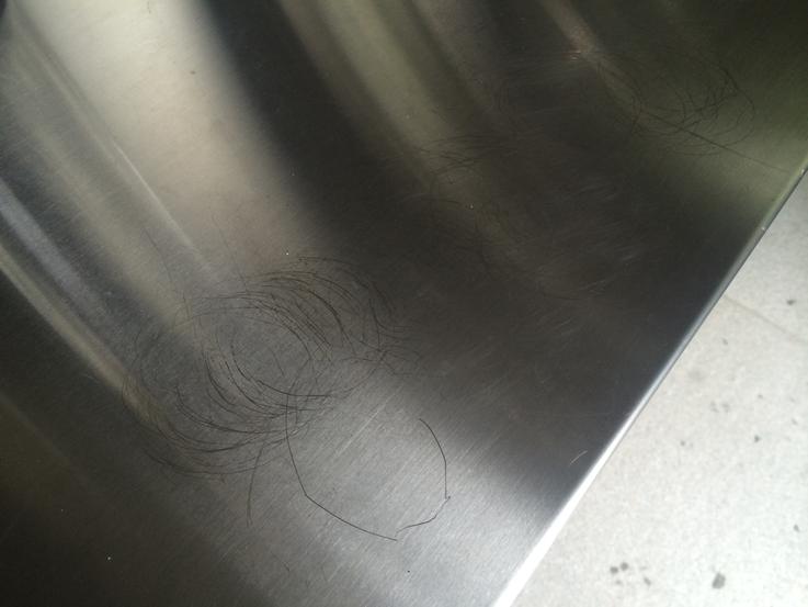 repair - How can I remove these stainless steel scratches? - Home  Improvement Stack Exchange