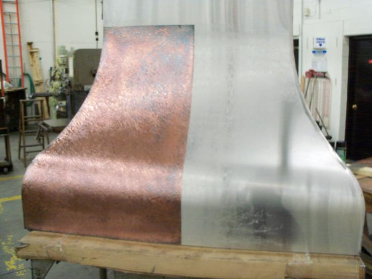Adhering the copper plating to the stainless steel body.